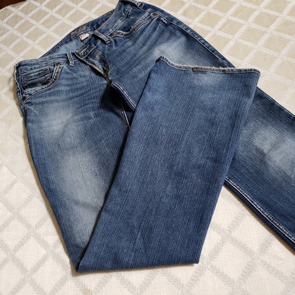Silver jeans. Flare leg , low rize.